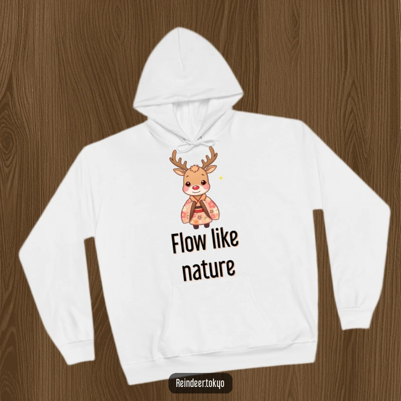 Funny hoodie depicting a whimsical reindeer in a beautiful floral kimono, performing a respectful, polite bow, radiating cozy humor and charm.