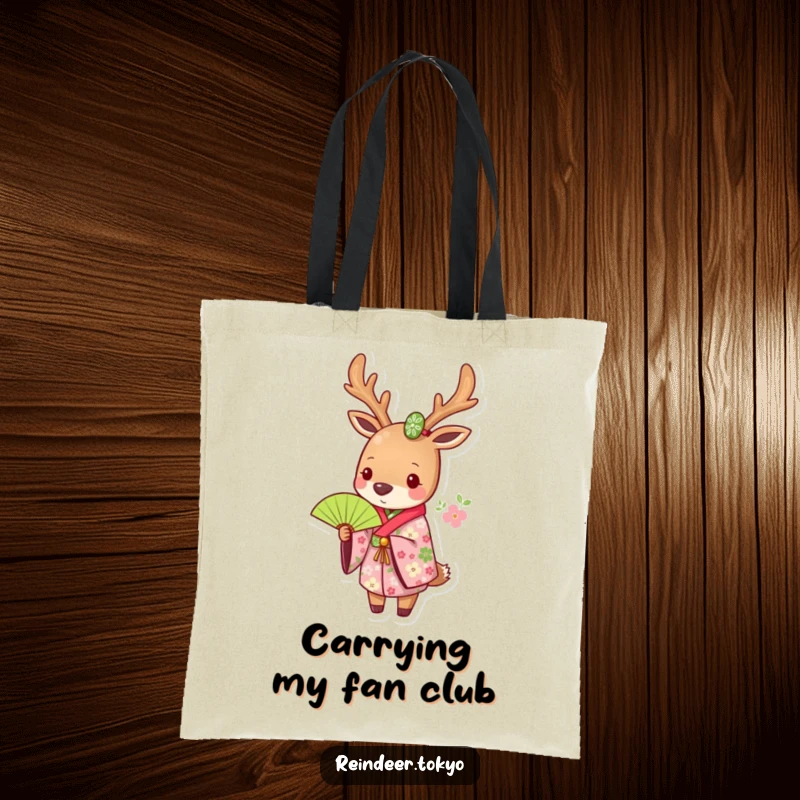 Funny tote bag featuring a reindeer in a floral kimono, holding a green fan, blending fashion and humor for daily use.